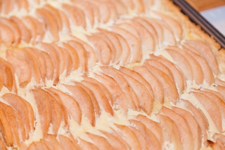 Large form with classic French pear tart.の写真素材