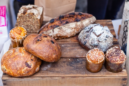 Delicious artisan breads for sale at local farmers market.