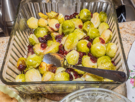 Brussels sprouts are simply seasoned with salt, pepper, and olive oil, then slow-roasted in a very hot oven until darkest brownの写真素材
