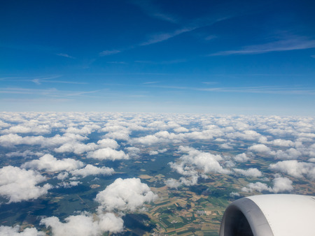 View of the sky from airplane window during flight