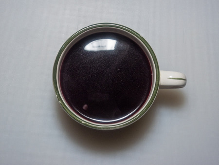 Gluhwein is usually prepared from red wine, heated and spiced with cinnamon sticks, cloves, star aniseed, citrus, sugar and at times vanilla pods.の写真素材