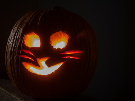 Jack-o'-lantern is a carved pumpkin, associated chiefly with the holiday of Halloween.の写真素材