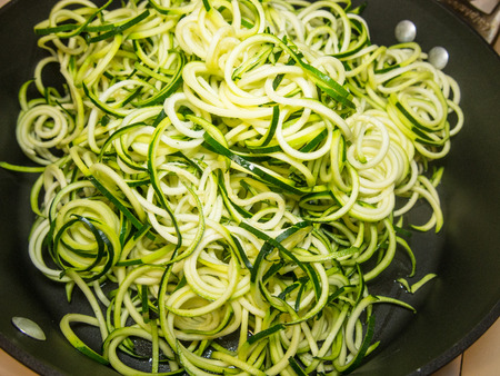 Making of spiral zucchini spaghetti imitation noodles.の写真素材