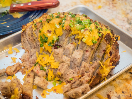 Party bread with grilled cheese and green onions.の写真素材