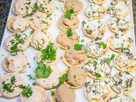 Savory mini cupcakes are not sweet, but elegant and tasty little treats perfect for serving as appetizersの写真素材