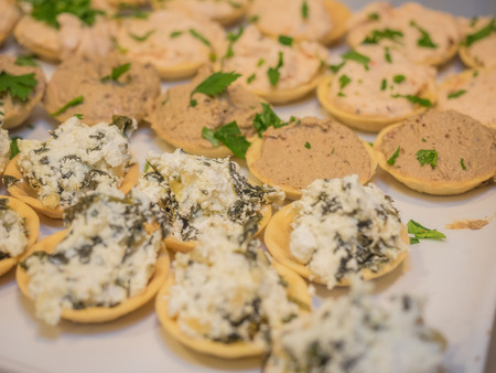 Savory mini cupcakes are not sweet, but elegant and tasty little treats perfect for serving as appetizersの写真素材