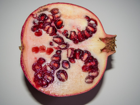 Pomegranate (Punica granatum) is a fruit-bearing deciduous shrub or small tree growing between 5 and...