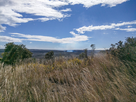 Steam vents between the caldera's edge and outer cliffs of K?lauea volcano.の写真素材