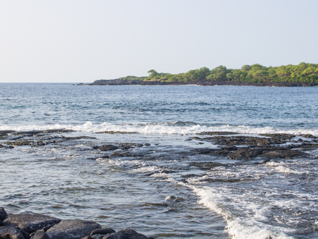 Puuhonua o Honaunau National Historical Park preserves the site where, up until the early 19th century, Hawaiians who broke a kapu (one of the ancient laws) could avoid certain death by fleeing to this place of refuge.の写真素材