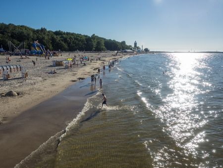 Coastline of the Baltic Sea in KoÅobrzeg and historical lighthouse.のeditorial素材