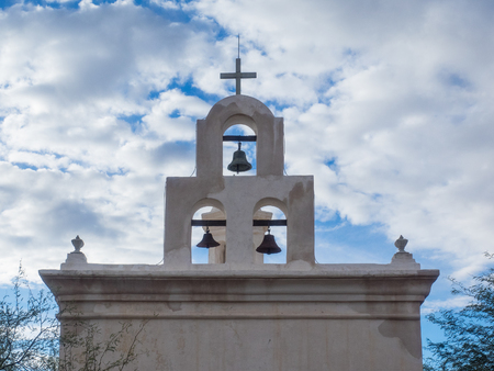 Mission San Xavier del Bac is a historic Spanish Catholic mission located about 10 miles (16 km) south of downtown Tucson, Arizona, on the Tohono O'odham San Xavier Indian Reservation.の写真素材