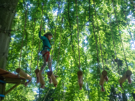 Kolobrzeg ropes course is full of challenges in the form of beams, platforms, ladders and nets.の写真素材