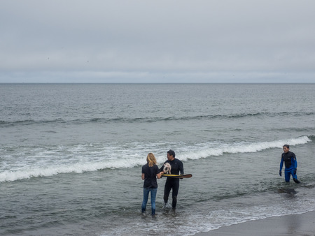 Pacifica, CA/USA - August 5, 2017: The second annual World Dog Surfing Championships brought together the top dog surfers and their humans.のeditorial素材