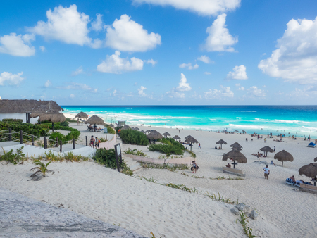 Dolphin Beach (Playa Delfines) is a broad stretch of white sandy beach featuring a few palapas and a playground.のeditorial素材