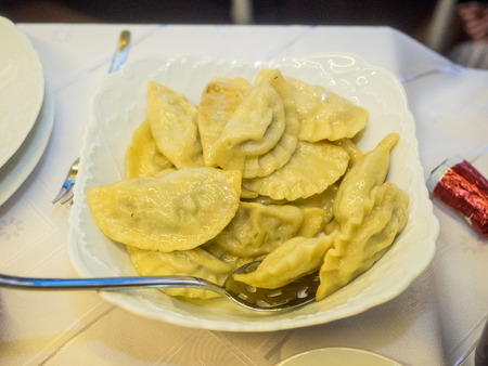 Pierogi are served in a variety of forms and tastes (ranging from sweet to salty to spicy) in Polish cuisine, considered to be the Polish national dish.の写真素材