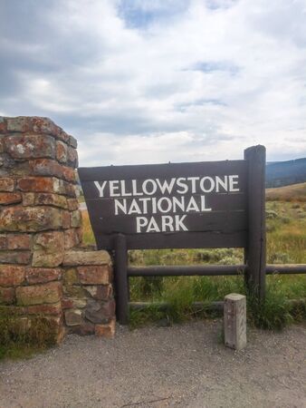 Yellowstone National Park is a nearly 3,500-sq.-mile wilderness recreation area atop a volcanic hot spot. Mostly in Wyoming, the park spreads into parts of Montana and Idaho too. Yellowstone features dramatic canyons, alpine rivers, lush forests, hot springs and gushing geysers, including its most famous, Old Faithful.の写真素材