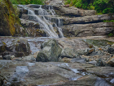 The Denny Creek Trail is extremely popular and for good reason!. A natural waterslide, two good...