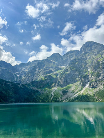 Eye of the Sea is the largest and fourth-deepest lake in the Tatra Mountains, in southern Poland. It is located deep within Tatra National Park in Fish Brook Valley, of the High Tatras mountain rangeの写真素材