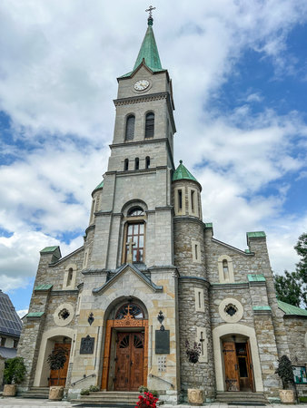 Holy Family Sanctuary is small, tranquil church in Zakopane, Poland, dedicated to the Holy Family with a painted interior & stained-glass windows.の写真素材