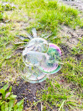 Soap bubble is an extremely thin film of soap or detergent and water enclosing air that forms a...