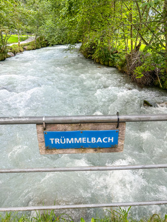 View of the TrÃ¼mmelbach river in Switzerland. This river is glacial and is the origin of the TrÃ¼mmelbach Falls which are a series of ten waterfalls inside the mountain.の写真素材