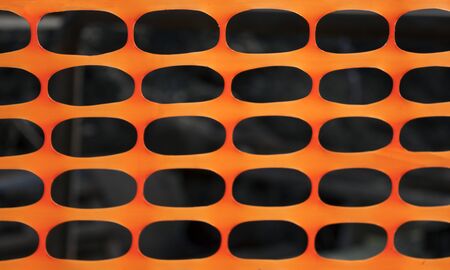 Abstract texture orange with black, mesh with oval cellsの写真素材