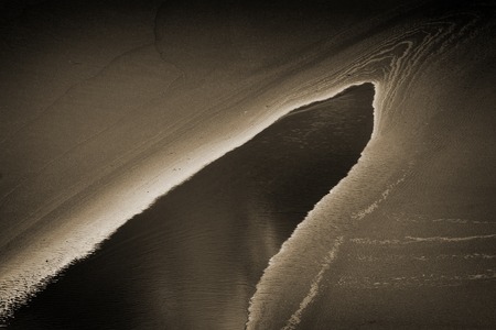 pond beach with strange designの写真素材