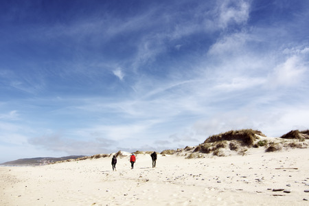 people walking on the beach of Razo Coast of death  Galicia Spainの写真素材