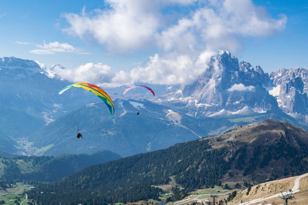 Paragliders flying in the Dolomites, Italy.の写真素材