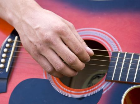 Playing guitar