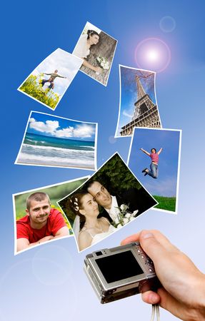 Digital point and shoot camera and pictures against blue skyの写真素材
