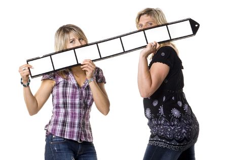 Mother and daughter holdig blank film stripの写真素材