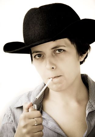 Woman lighting a cigaretteの写真素材