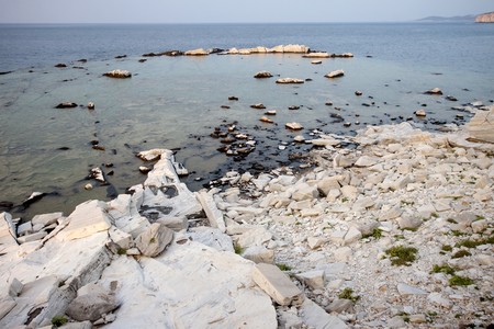 Blocks of marble in the sea on Aliki, Thassos island, Greece の写真素材