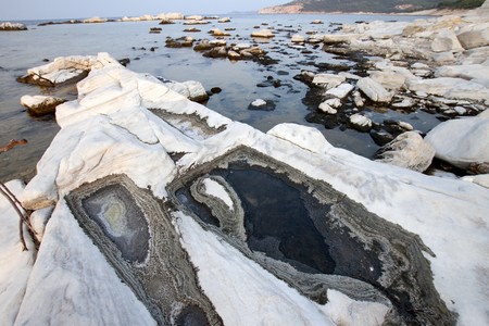 Blocks of marble in the sea on Aliki, Thassos island, Greece の写真素材