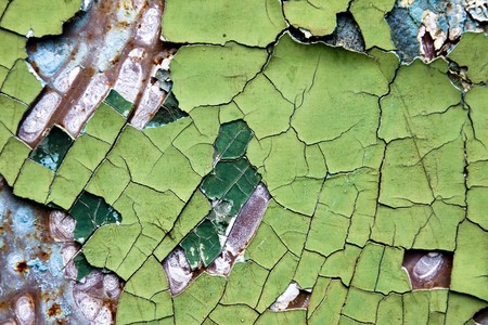 Old dry paint on rusted metalの写真素材