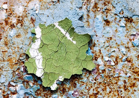 Old dry paint on rusted metalの写真素材