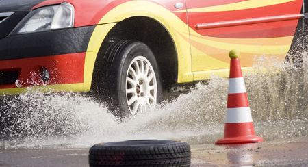 Racing car entering waterの写真素材