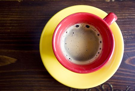 Coffee in red cupの写真素材