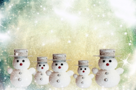 Christmas card with snowman and place for textの写真素材