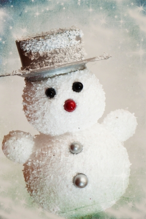 Vintage Christmas card with snowmanの写真素材