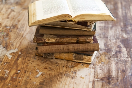Old books on wooden backgroundの写真素材