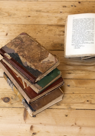 Old books on wooden backgroundの写真素材