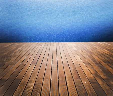 Sunny sea and wooden walkway