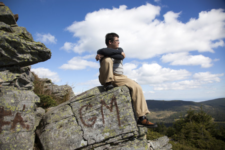 Male photographer on a cliff