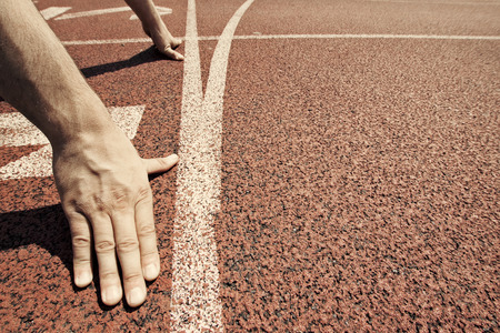 Hands on starting line Hands on starting line