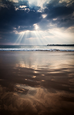 Sunset on tropical beachの写真素材