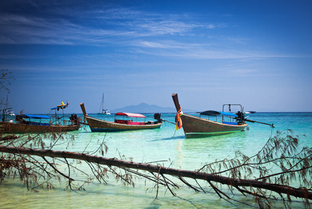 Longtail boats on the beautiful beach, Thailandの写真素材