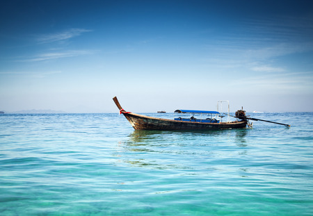 Longtail boats on the beautiful beach, Thailandの写真素材