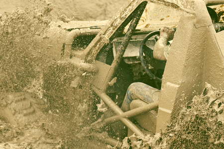 Off road car participating in off-road challenge